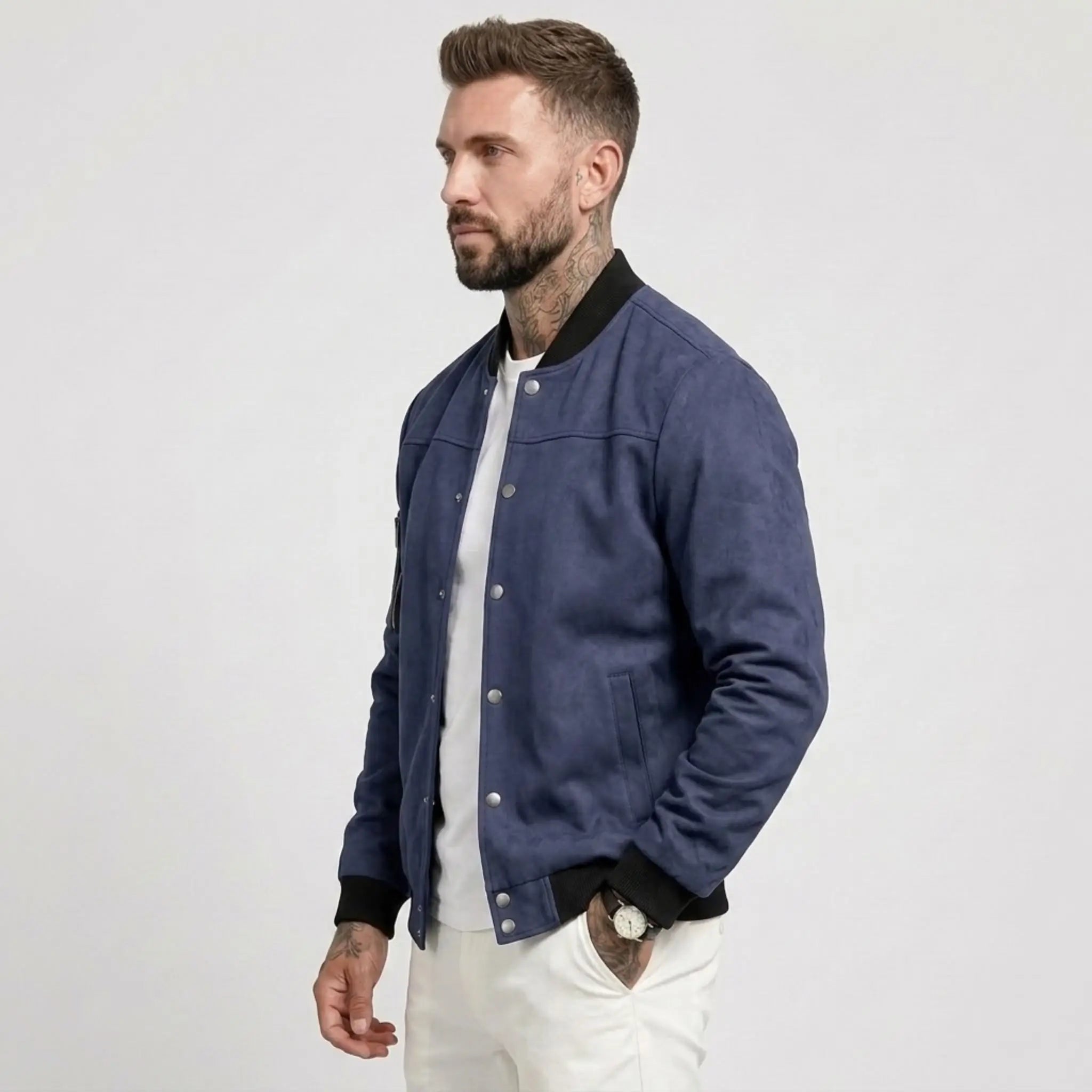Man wearing MannerCo navy blue suede-blend stand collar jacket, side view on plain background