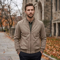 MannerCo khaki suede thermal jacket with stand collar modeled outdoors in autumn setting