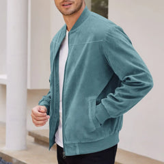 MannerCo peacock blue suede thermal jacket with stand collar and patch pockets worn open over white tee