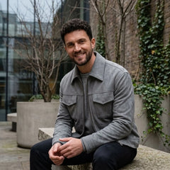 MannerCo slim fit thickened zip jacket in dark gray with big pockets and straight hem worn outdoors