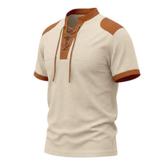 MannerCo apricot waffle knit pullover with brown lace-up collar, shoulder patches, and contrast sleeve cuffs, product display