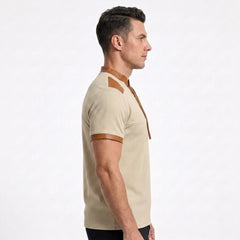 MannerCo waffle knit pullover in apricot with tan leather-trim stand collar and sleeve detail, side view