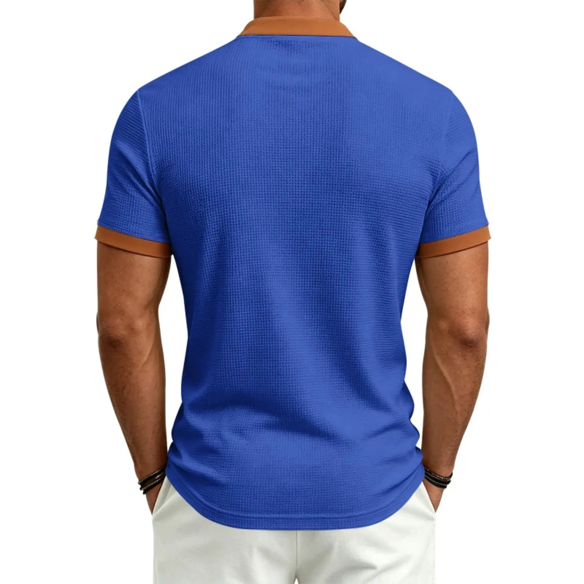 MannerCo blue waffle knit color-block polo back view with tan collar and sleeve trim