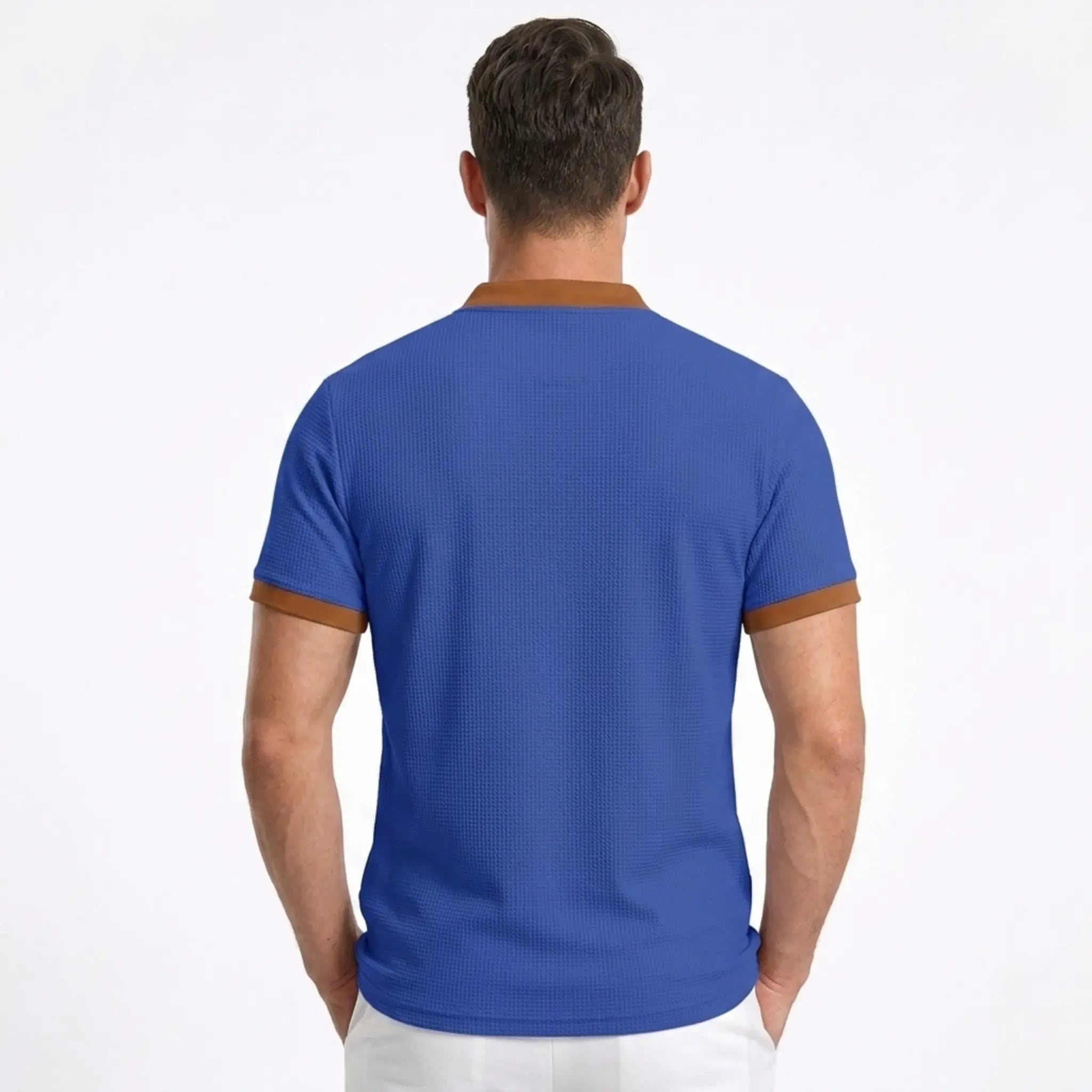 MannerCo blue waffle knit polo back view with brown contrast collar and cuffs