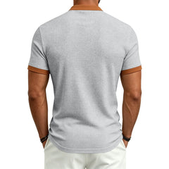 MannerCo light gray waffle knit color-block polo back view with brown collar and sleeve trim