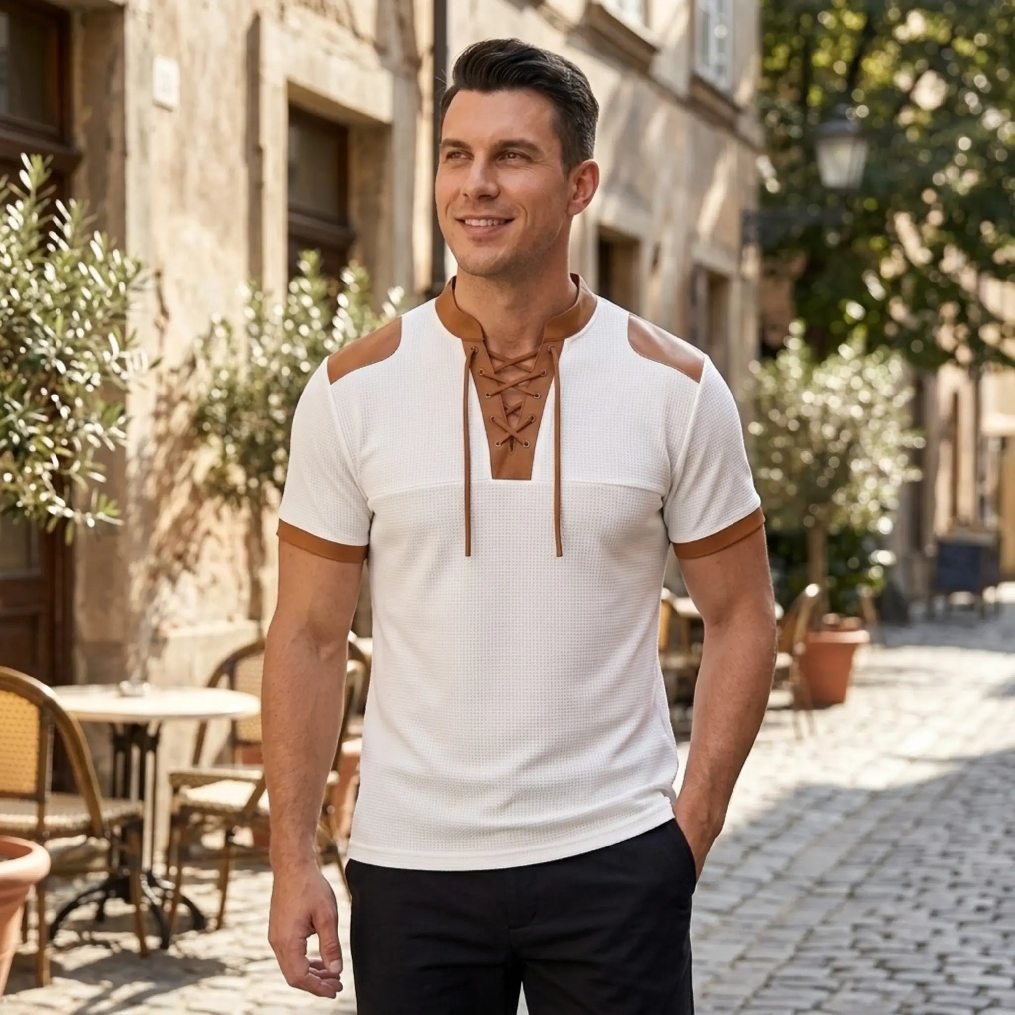 MannerCo white waffle knit color-block pullover with tan lace-up stand collar, worn by man outdoors