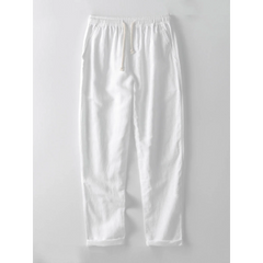 Man wearing white and beige geometry textured Cuban shirt and straight leg linen pants front view