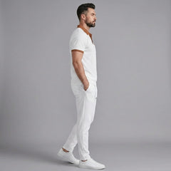 Back view of man wearing white color block waffle polo and straight leg pants
