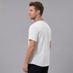 MannerCo white linen blend short sleeve shirt with contrast patterned collar, back view on model