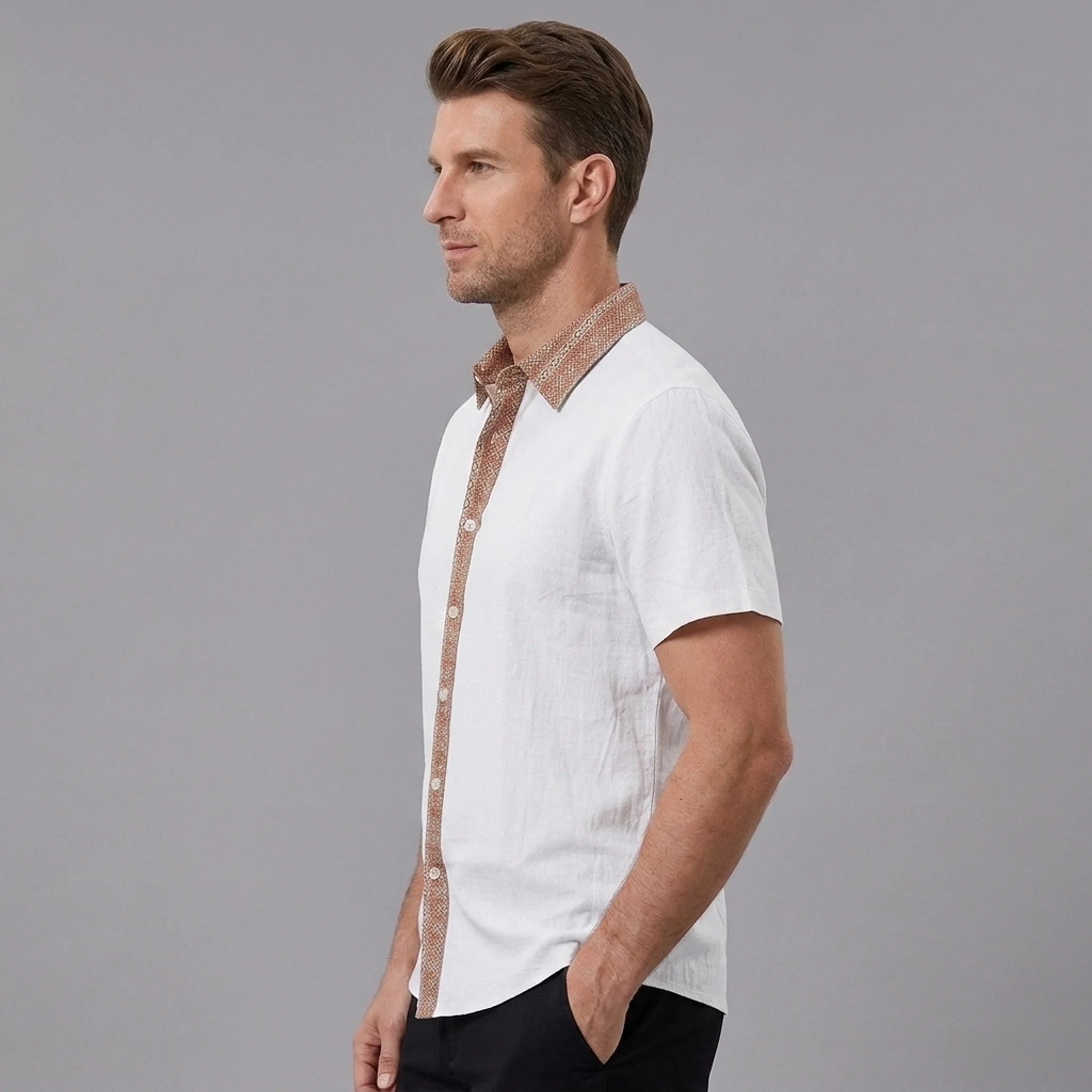 MannerCo white linen blend short sleeve shirt with contrast terracotta collar and placket, side view on model
