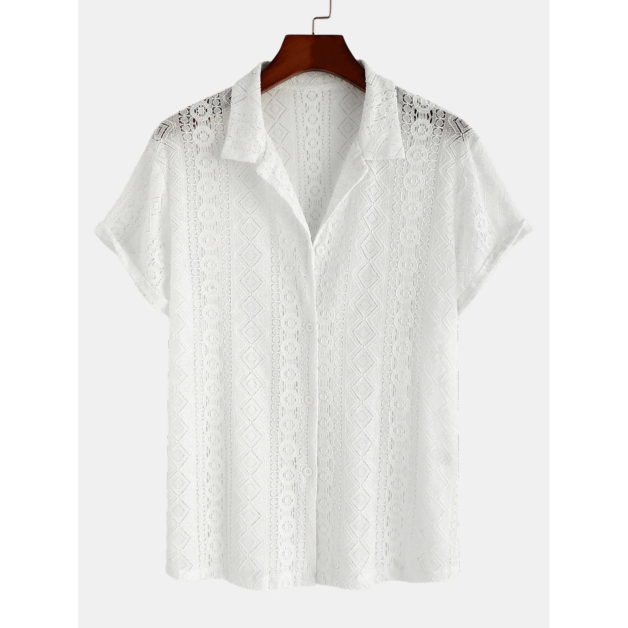 Full length view of man wearing white geometry textured Cuban shirt and linen pants on white background