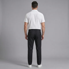 Back view of man wearing white linen Cuban collar shirt and slim fit tapered trousers