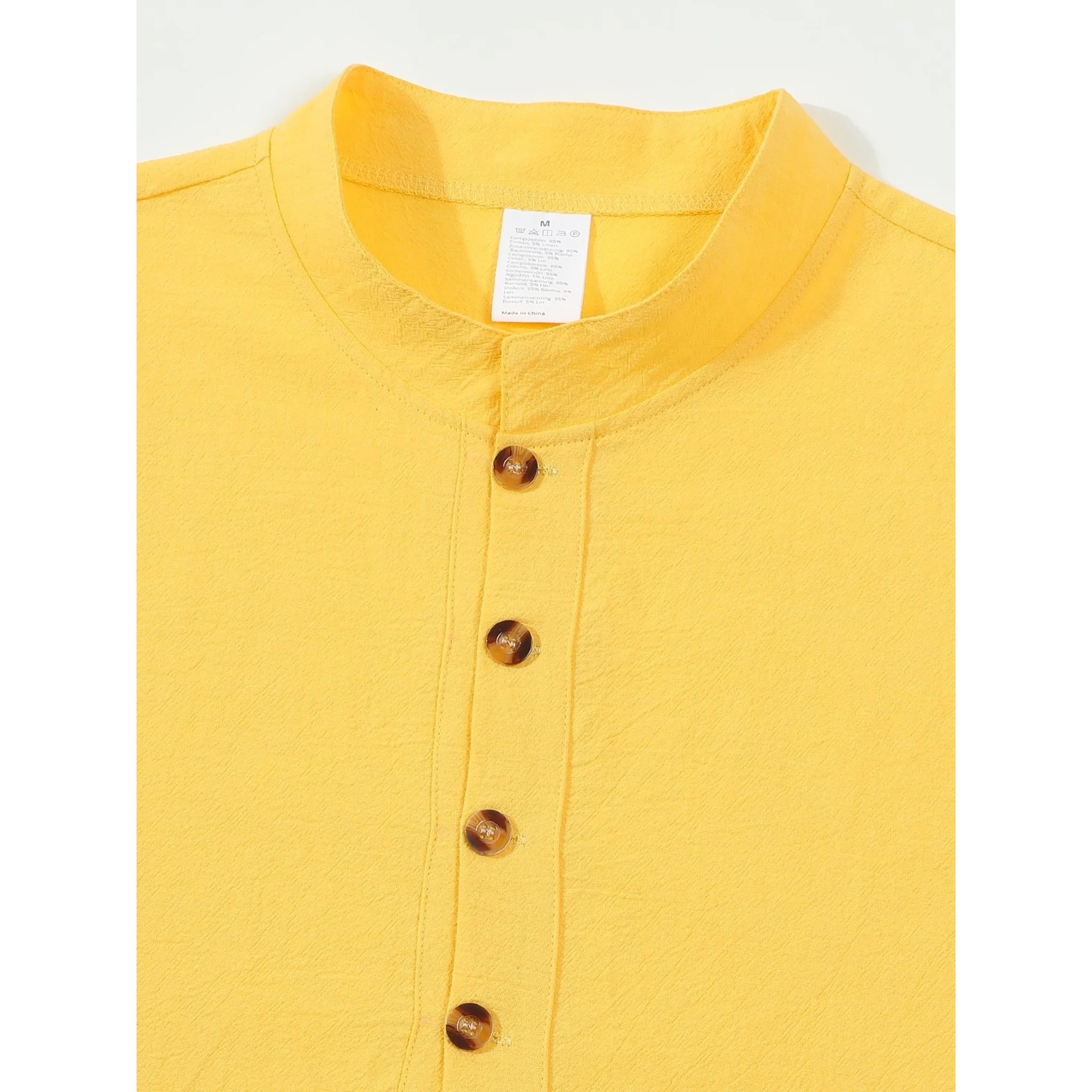 Man wearing white linen jacquard polo shirt in outdoor lifestyle scene