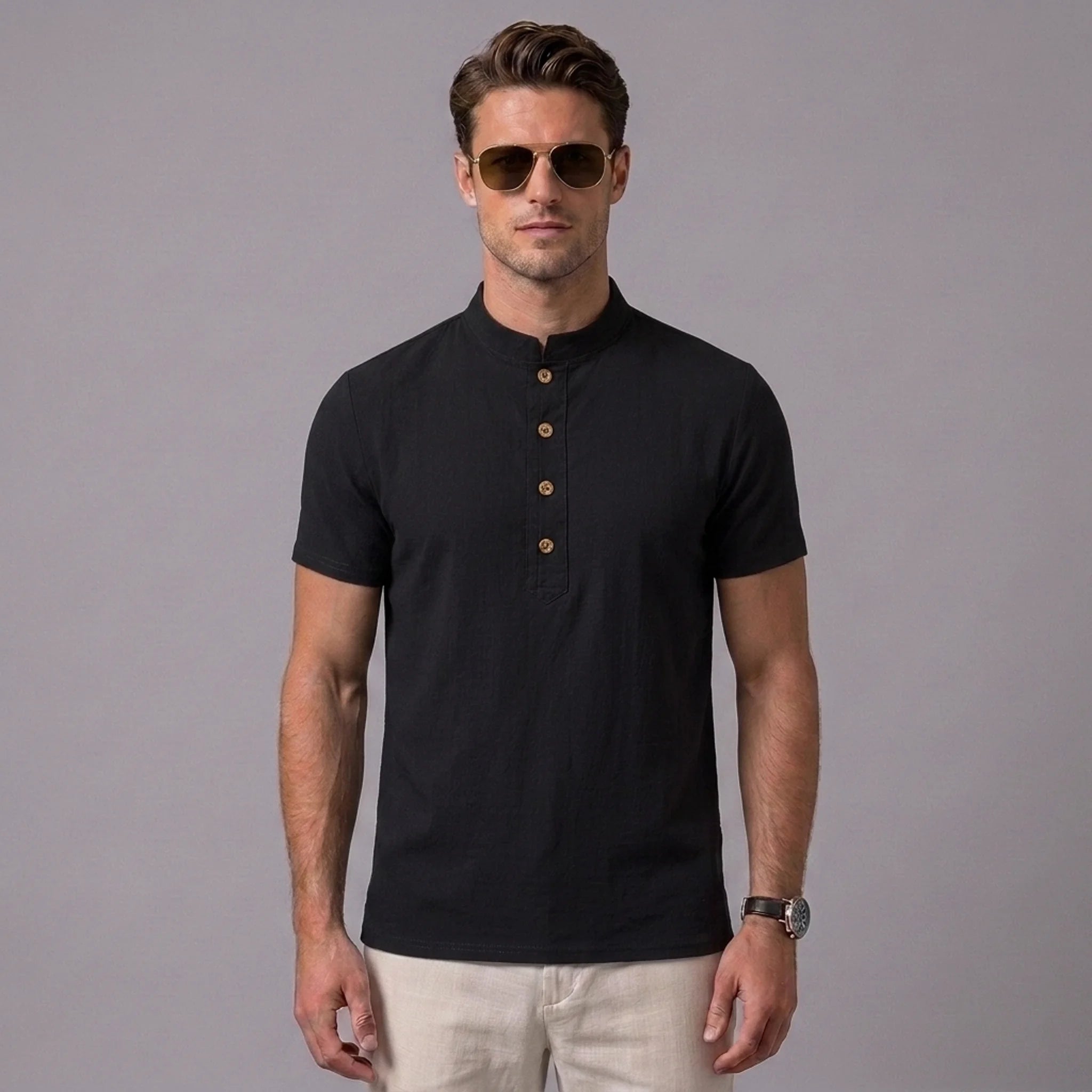 Man wearing a white linen jacquard short sleeve polo shirt front view on plain background
