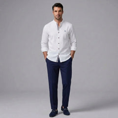MannerCo white linen stand collar shirt and navy slim tapered trousers 2-piece set front view