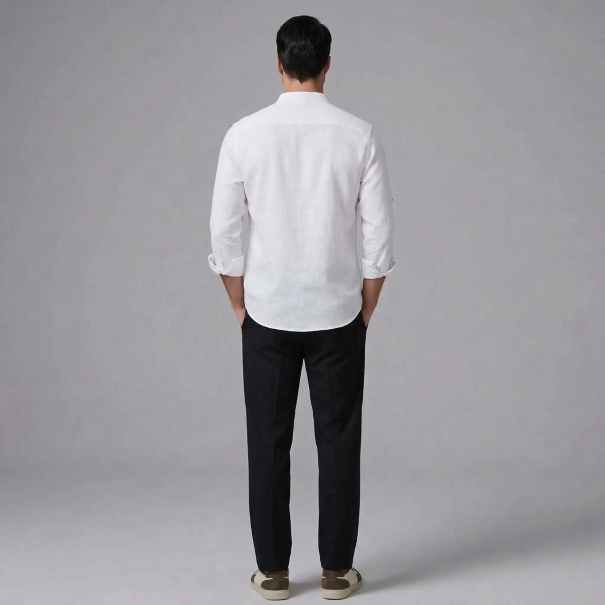 MannerCo white linen stand collar shirt with slim tapered trousers set back view