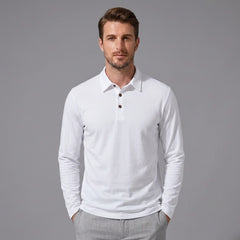 Man wearing white solid long sleeve cotton polo shirt with classic collar and dark buttons, front view