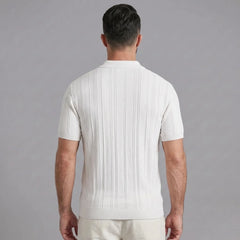Man wearing a white stripe jacquard knit zip-up polo shirt front view on plain background