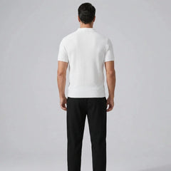 Back view of man in white striped knit Johnny collar polo and waffle drawstring pants