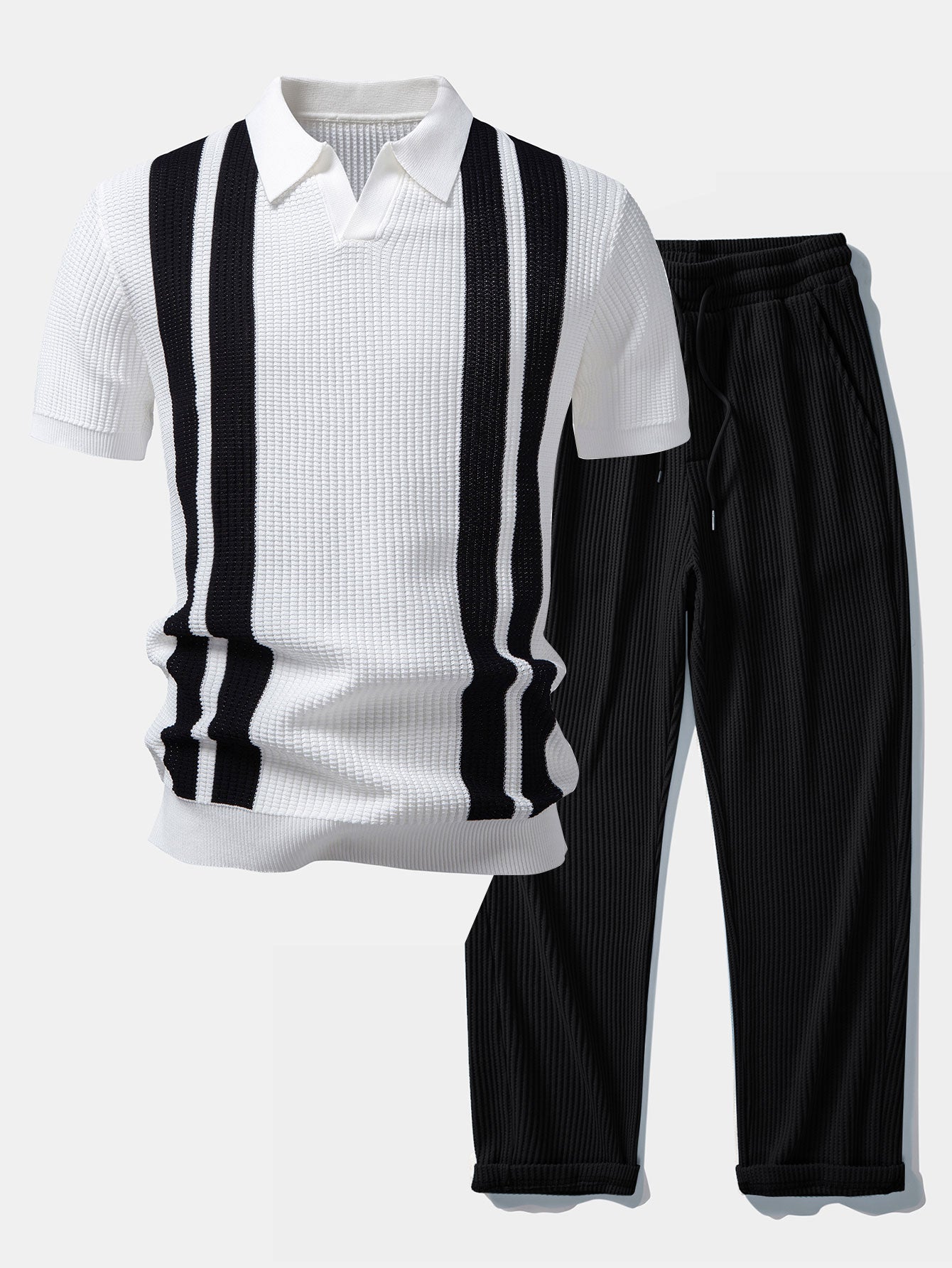 Man wearing white striped knit Johnny collar polo and waffle drawstring pants in outdoor lifestyle setting