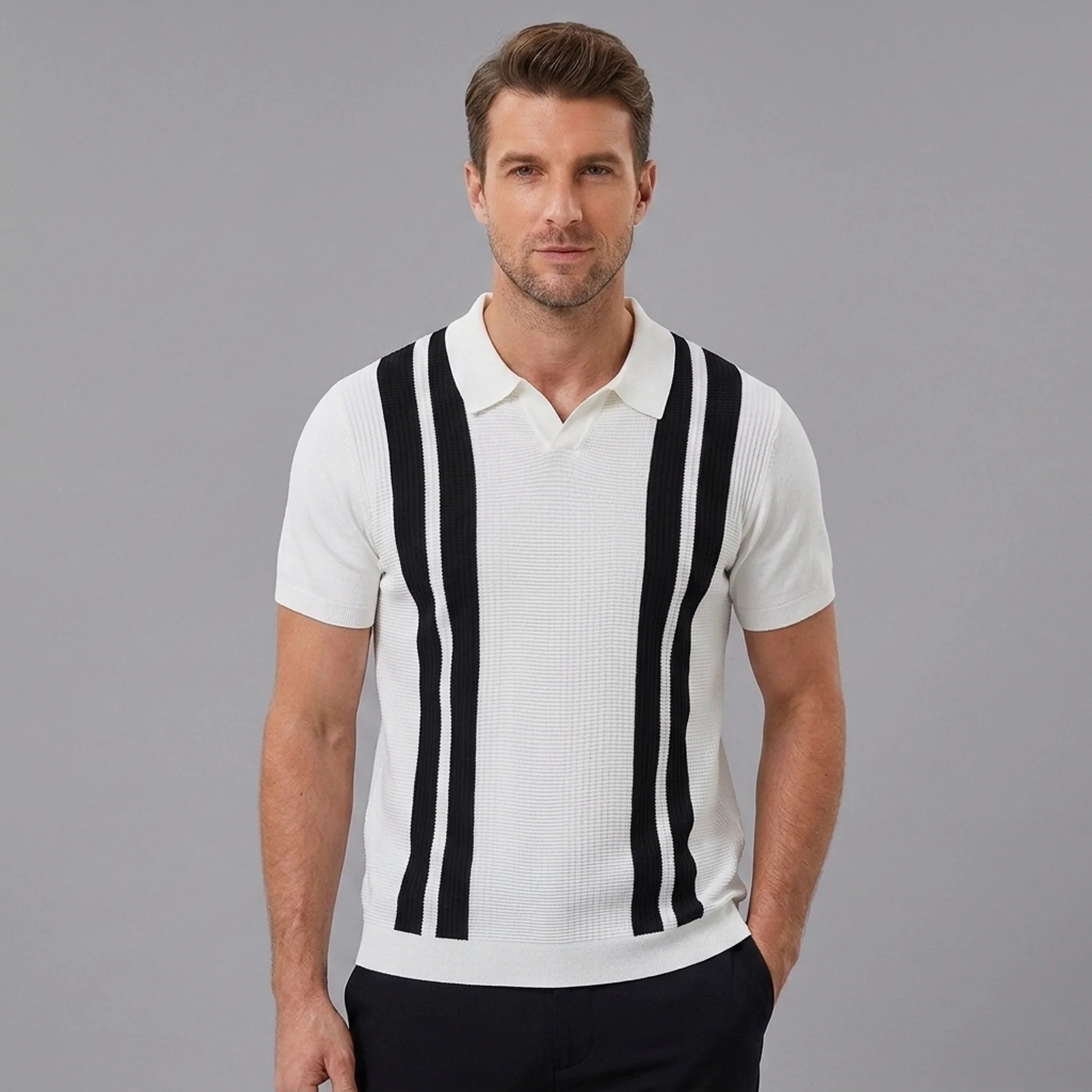 Man wearing a white striped knit slim fit polo shirt front view on plain background