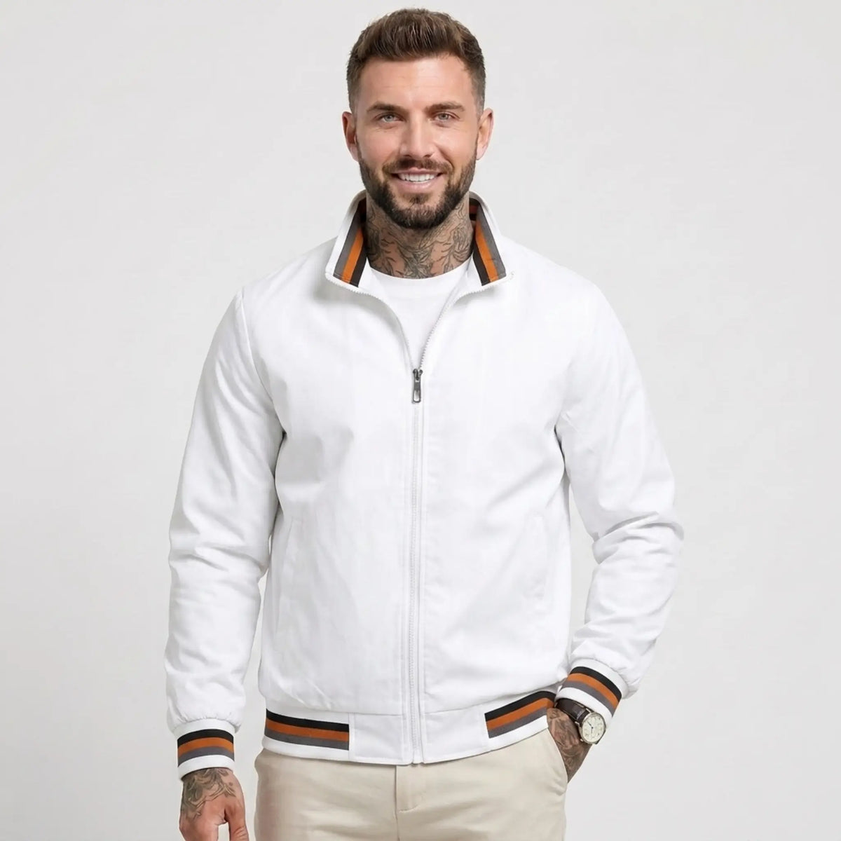 Man wearing MannerCo white waterproof windbreaker jacket with stand collar, front view