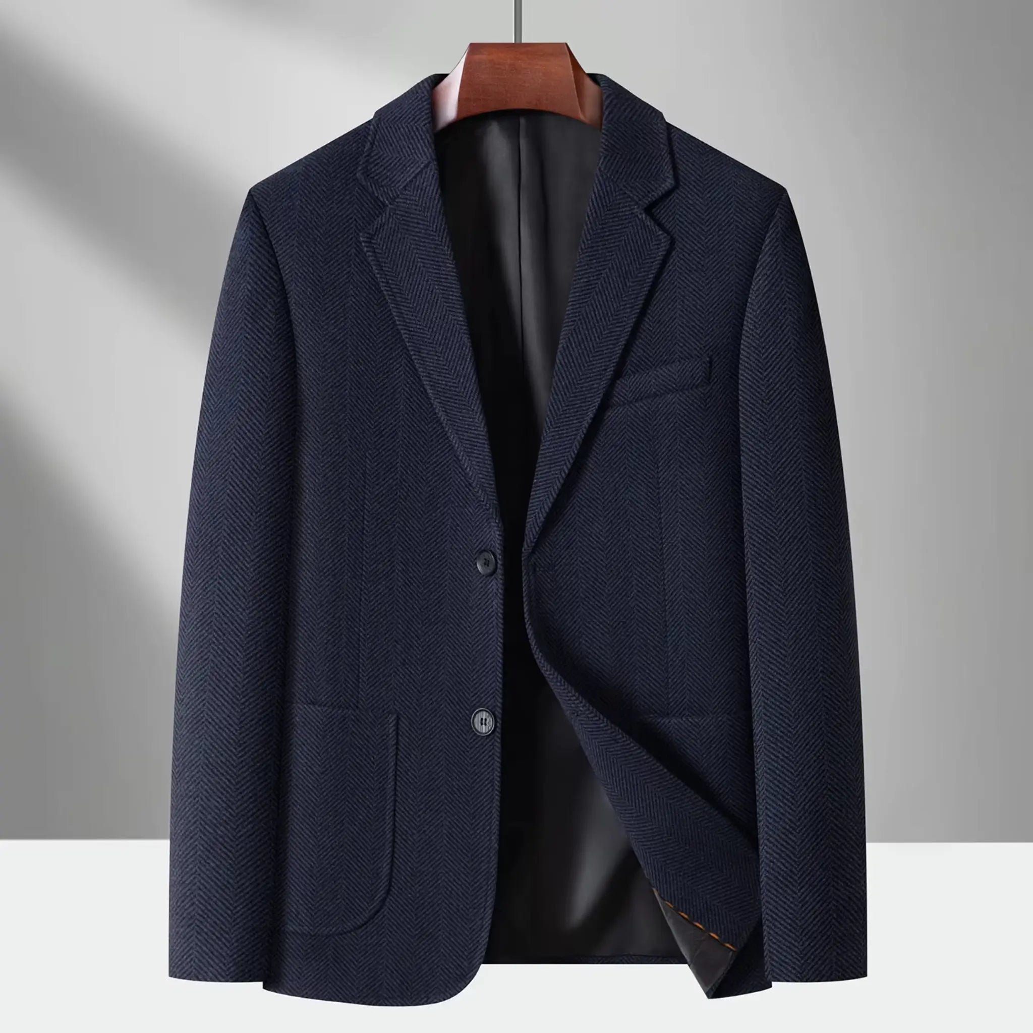 MannerCo dark blue woolen blazer two-button loose fit on hanger product display