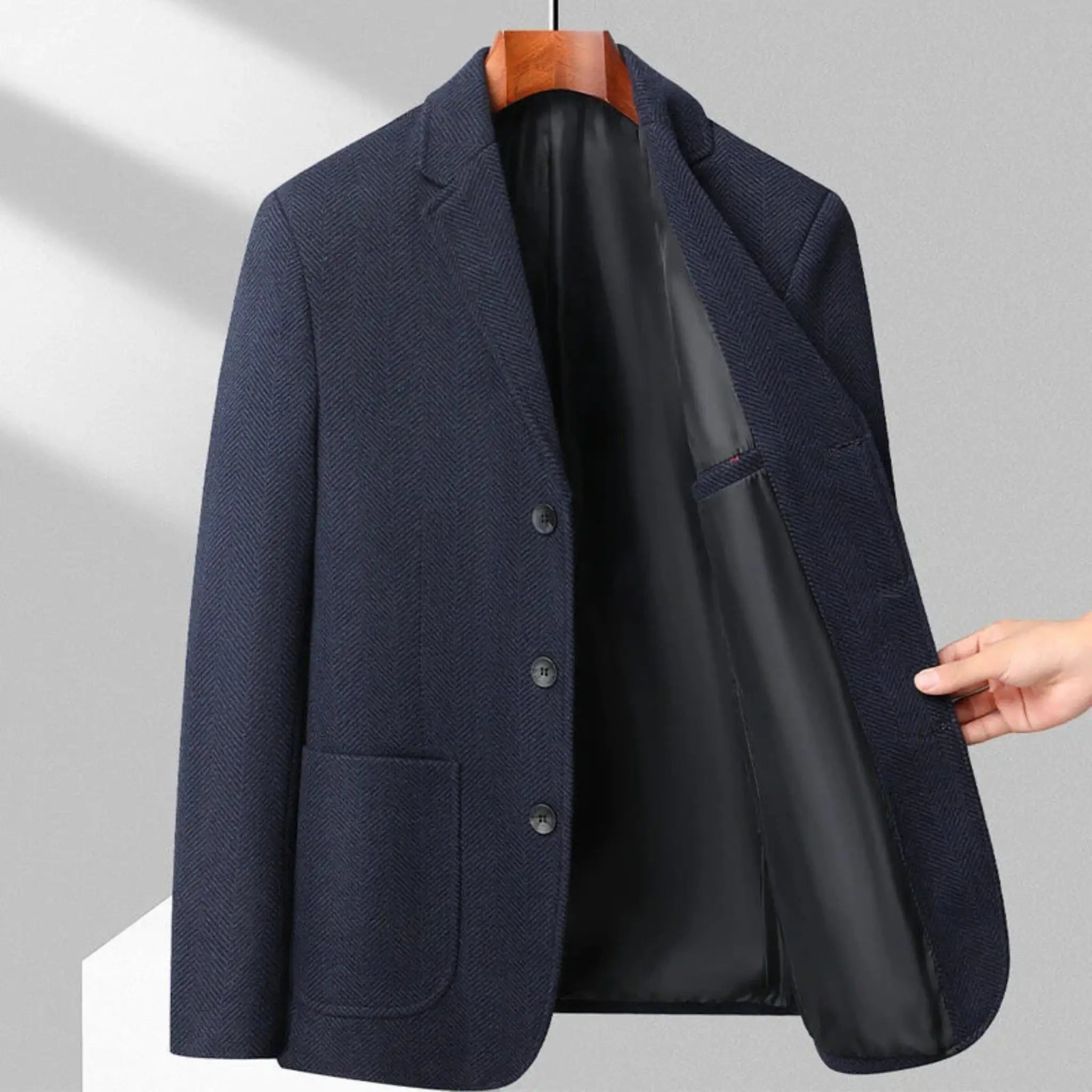 MannerCo dark blue woolen blazer on hanger open front showing black satin lining