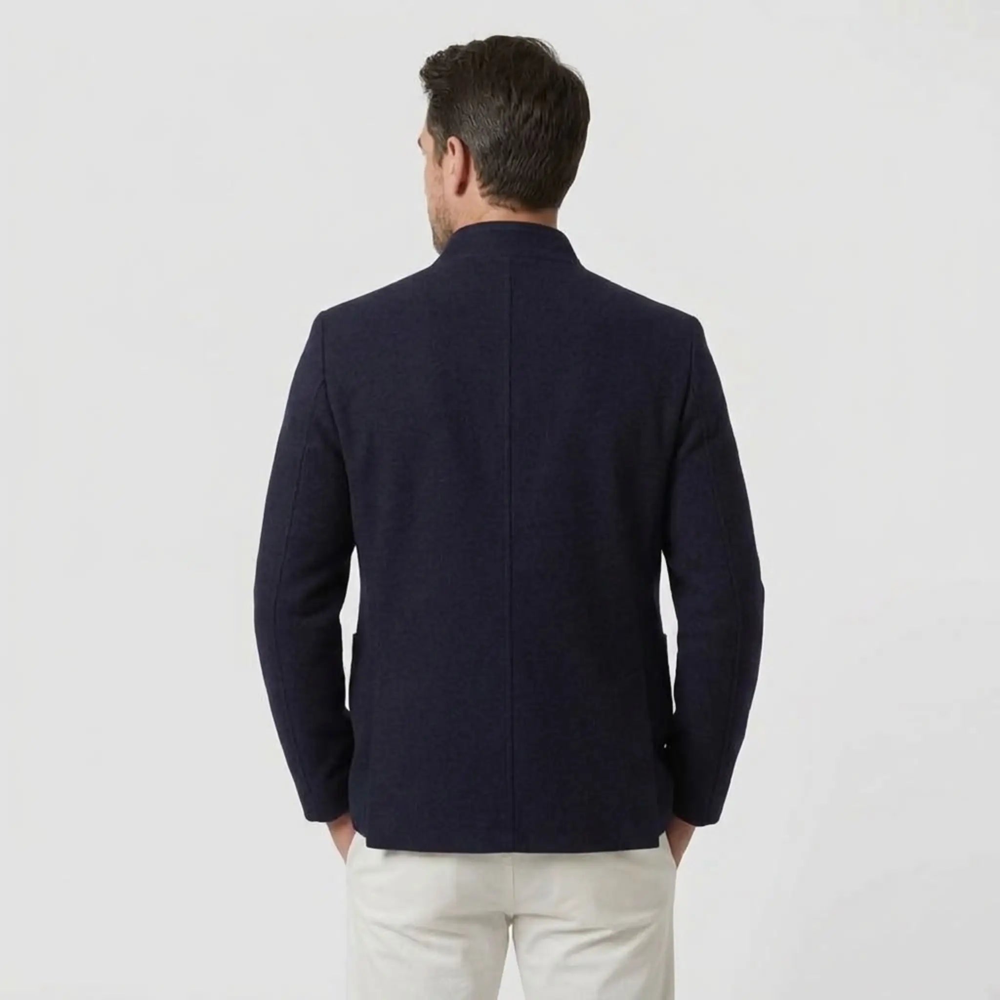 MannerCo navy blue double-faced wool overcoat stand collar back view on male model