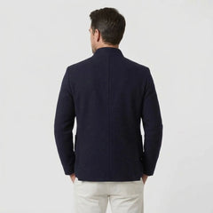 MannerCo navy blue double-faced wool overcoat stand collar back view on male model