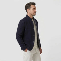 MannerCo navy blue double-faced wool overcoat with stand collar and button closure side view
