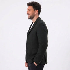 MannerCo dark blue woolen suit coat side view on male model loose fit blazer for spring autumn