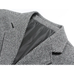 MannerCo gray woolen suit coat detail showing lapel collar and dark satin lining