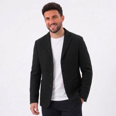 MannerCo black woolen blazer loose fit worn by male model spring autumn suit coat