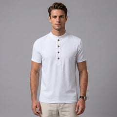 Man wearing a yellow linen jacquard short sleeve polo shirt front view on plain background
