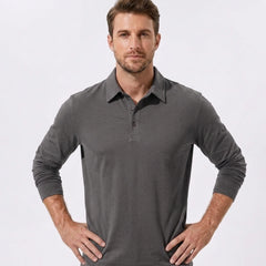 Man wearing yellow solid long sleeve cotton polo shirt in outdoor lifestyle setting